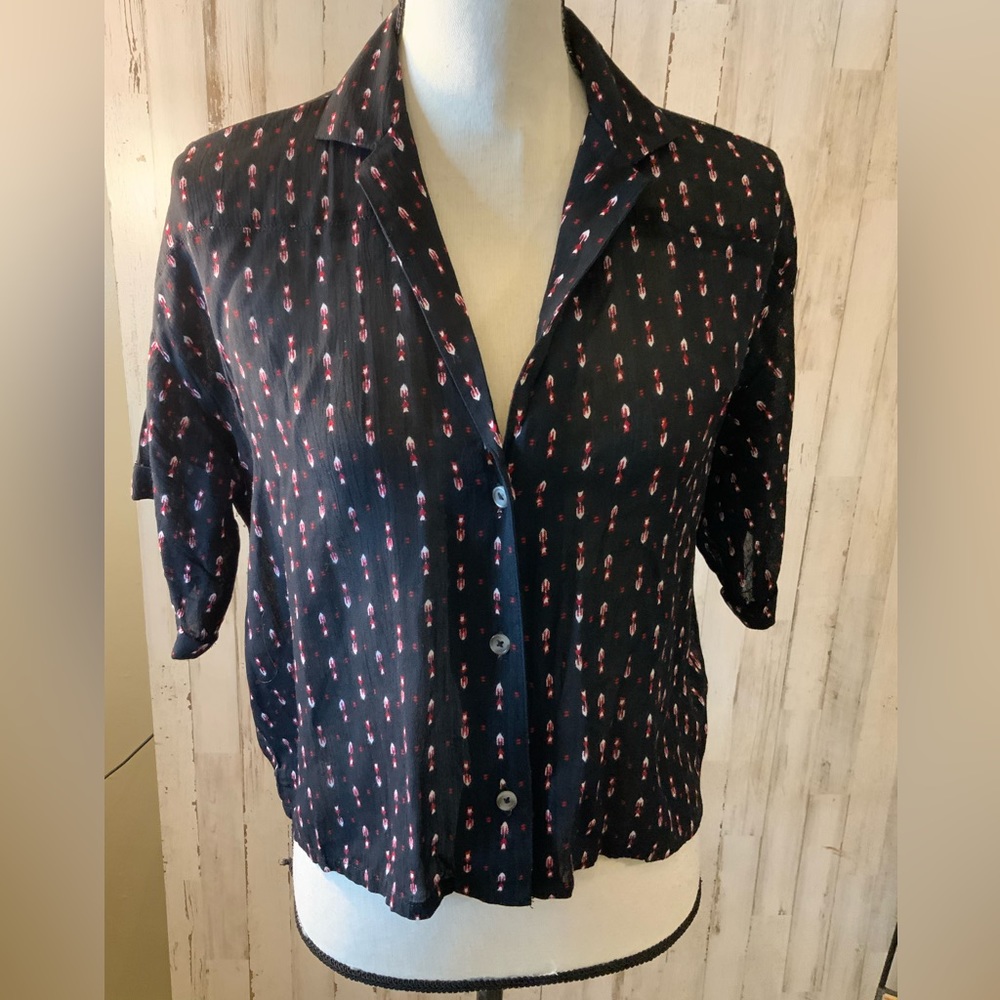 Urban Outfitters short length button down with arrow design. Size XS